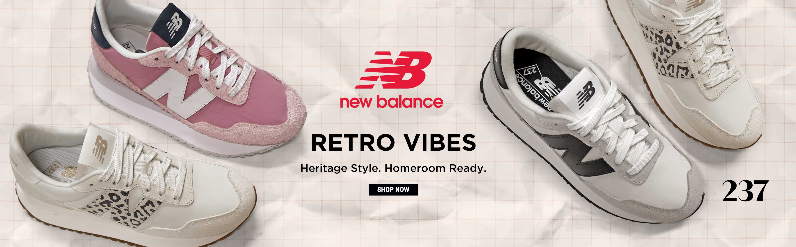 Athletic shoes display at Shoe Dept Encore featuring New Balance and other premium brands